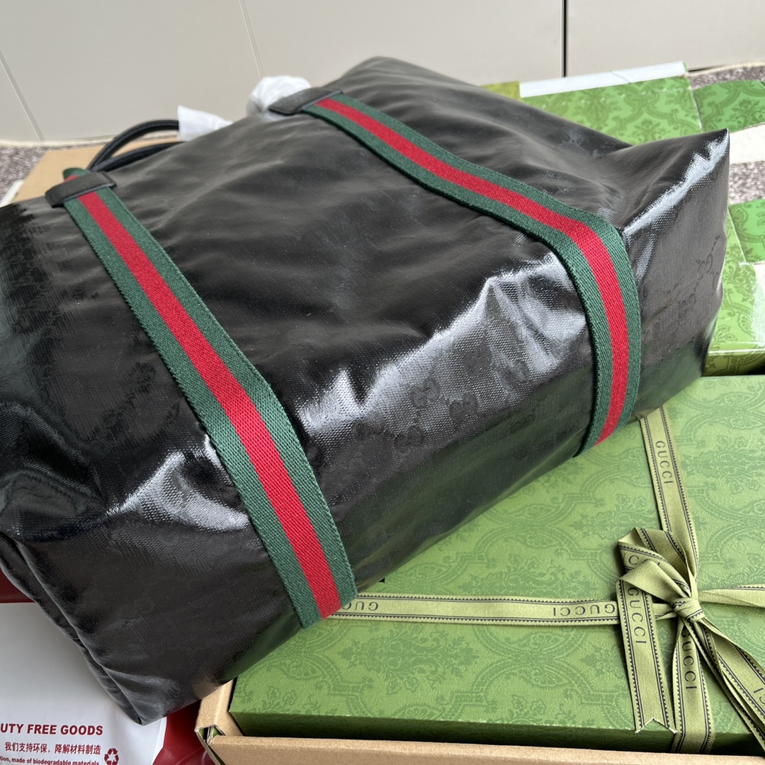 Gucci [With full set of original green gift bag] GG crystal canvas medium tote bag. Gucci crystal glamor reinterprets men's accessories, bringing