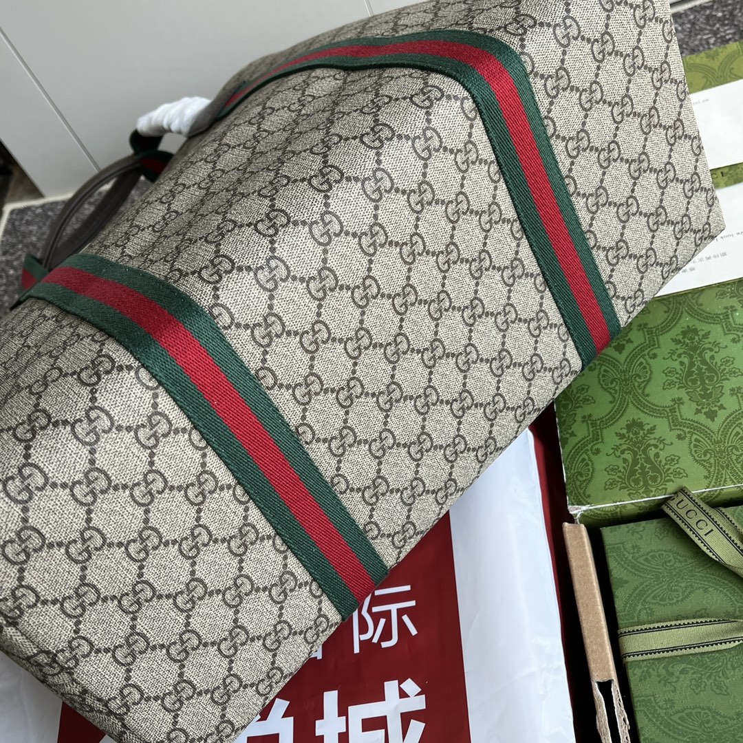 Gucci [With full set of original green gift bag] GG crystal canvas medium tote bag. GG Crystal Canvas is a glamorous interpretation of men's acce