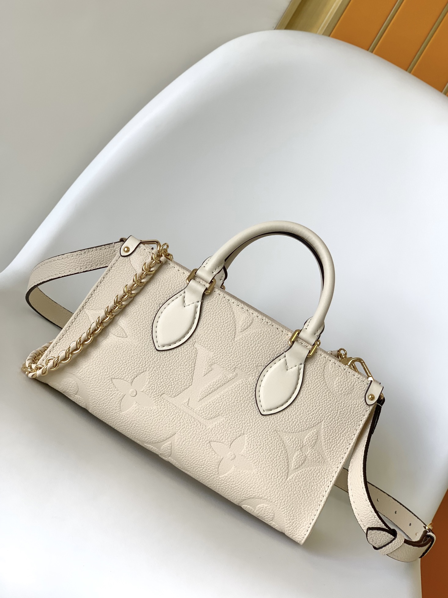 Louis Vuitton LV Onthego Handbags Tote Bags Apricot Color Beige Black White Empreinte​ Cowhide Chains M23640