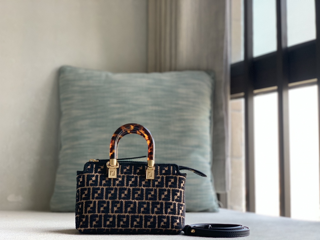 Fendi's iconic pillow bag medium By the way with leather shoulder strap, woven in original color raffia and embroidered with brocade-effect cheni