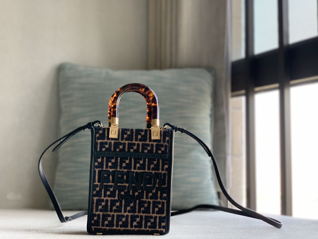 Fendi Sunshine mini genuine tote bag in original raffia woven with brocade-effect chenille FF pattern embroidery for a unique feel. Decorated wit