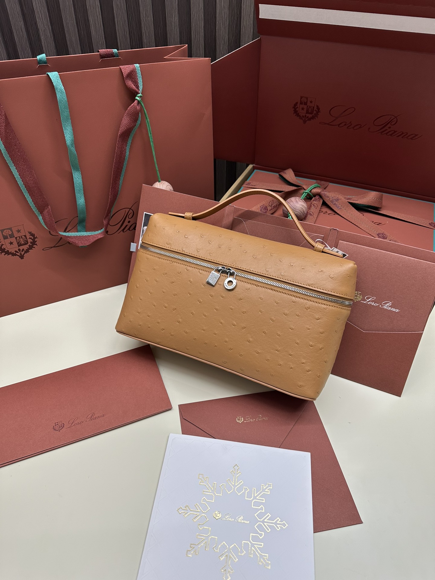 Luxurious Loro Piana Handbag with Ostrich Leather and My Charms Zipper