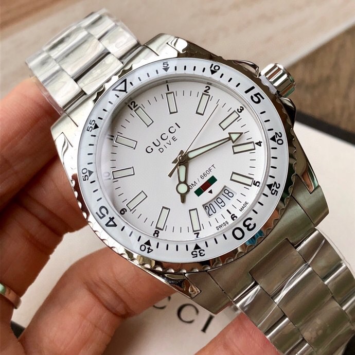 NO:924147,Original Gucci Gucci men's quartz watch, classic water ghost model!  Original movement imported from Switzerland, anti-glare sapphire scratch-resistant glass mirror, scale pointer with super luminous, ceramic outer ring can rotate in one direction, classic colors of the ceramic ring mouth echo each other, 316 case and strap with double-press butterfly buckle, simple but not monotonous, large calendar window display, fashionable and classic, a must-have item for fashionable men!  Table diameter ~40mm, meter depth waterproof, complete packaging!  ,,gucci,gucci19860909Original Gucci 古驰男士石英腕表,经典水鬼款！原装瑞士进口机芯,防眩目蓝宝石防刮花玻璃镜面,刻度指针带超强夜光,陶瓷外圈可单向旋转,陶瓷圈口经典彩色相互呼应,316表壳及表带搭配双按蝴蝶扣,简单却不单调,大日历窗口显示,时尚又经典,时尚潮男必备的单品！表径~40mm,米深度防水,配全套包装！,,gucci,gucci,Watch