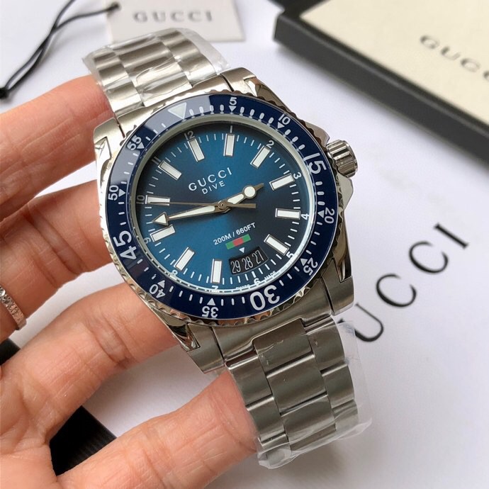 NO:152437,Original Gucci Men's Quartz Watch, Classic Water Ghost Style!  Original Swiss imported movement, anti-glare sapphire anti-scratch glass mirror, scale pointer with super luminous light, ceramic outer ring can rotate one-way, the classic color of the ceramic ring mouth echoes each other, the 316 case and strap are paired with double-press butterfly buckle, simple but not monotonous, large calendar window display, fashionable and classic, a must-have item for fashionable and trendy men!  The watch diameter is ~40mm, the depth of meter waterproof, equipped with a full set of packaging!  ,gucci,gucci19860909Original Gucci 古驰男士石英腕表,经典水鬼款！原装瑞士进口机芯,防眩目蓝宝石防刮花玻璃镜面,刻度指针带超强夜光,陶瓷外圈可单向旋转,陶瓷圈口经典彩色相互呼应,316表壳及表带搭配双按蝴蝶扣,简单却不单调,大日历窗口显示,时尚又经典,时尚潮男必备的单品！表径~40mm,米深度防水,配全套包装！,,gucci,gucci,Watch