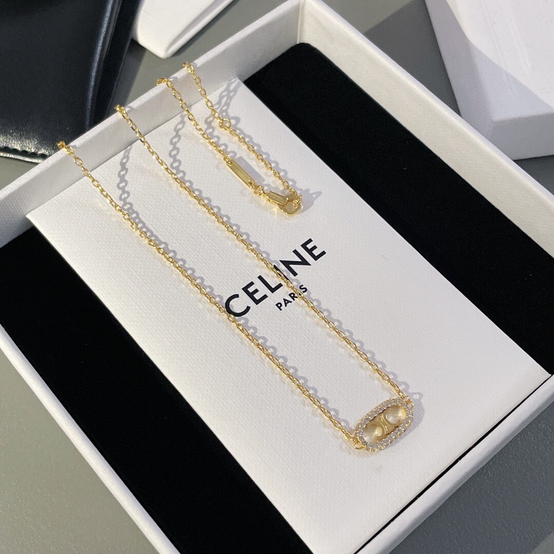 Celine Triomphe Oval Crystal Pearl bracelet gold-tone metal with clear crystals and white pearl accents 18cm