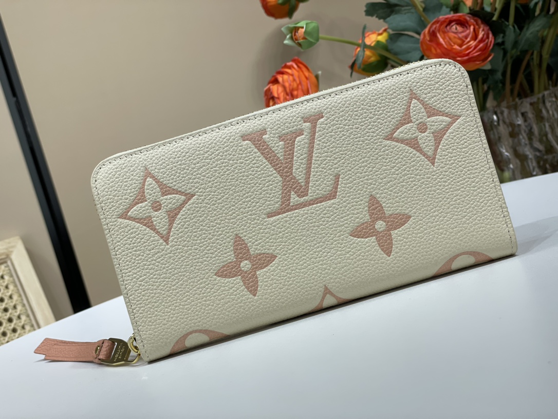 Louis Vuitton Portefeuilles Couleur abricot Blanc Empreinte​ m60017