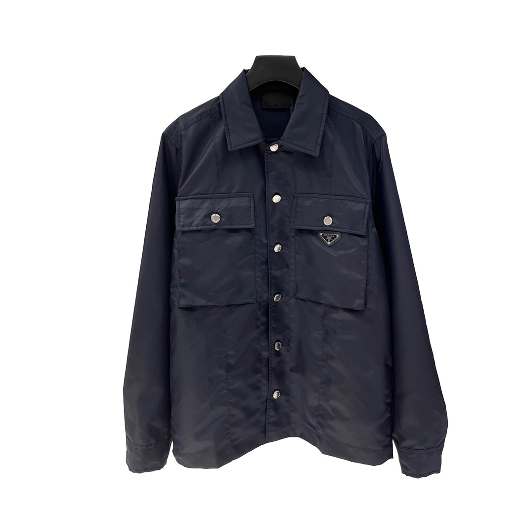 Camisa de Prada con logo triangular, confeccionada en nailon regenerado Re-Nylon, corte regular, cuello de camisa con b…