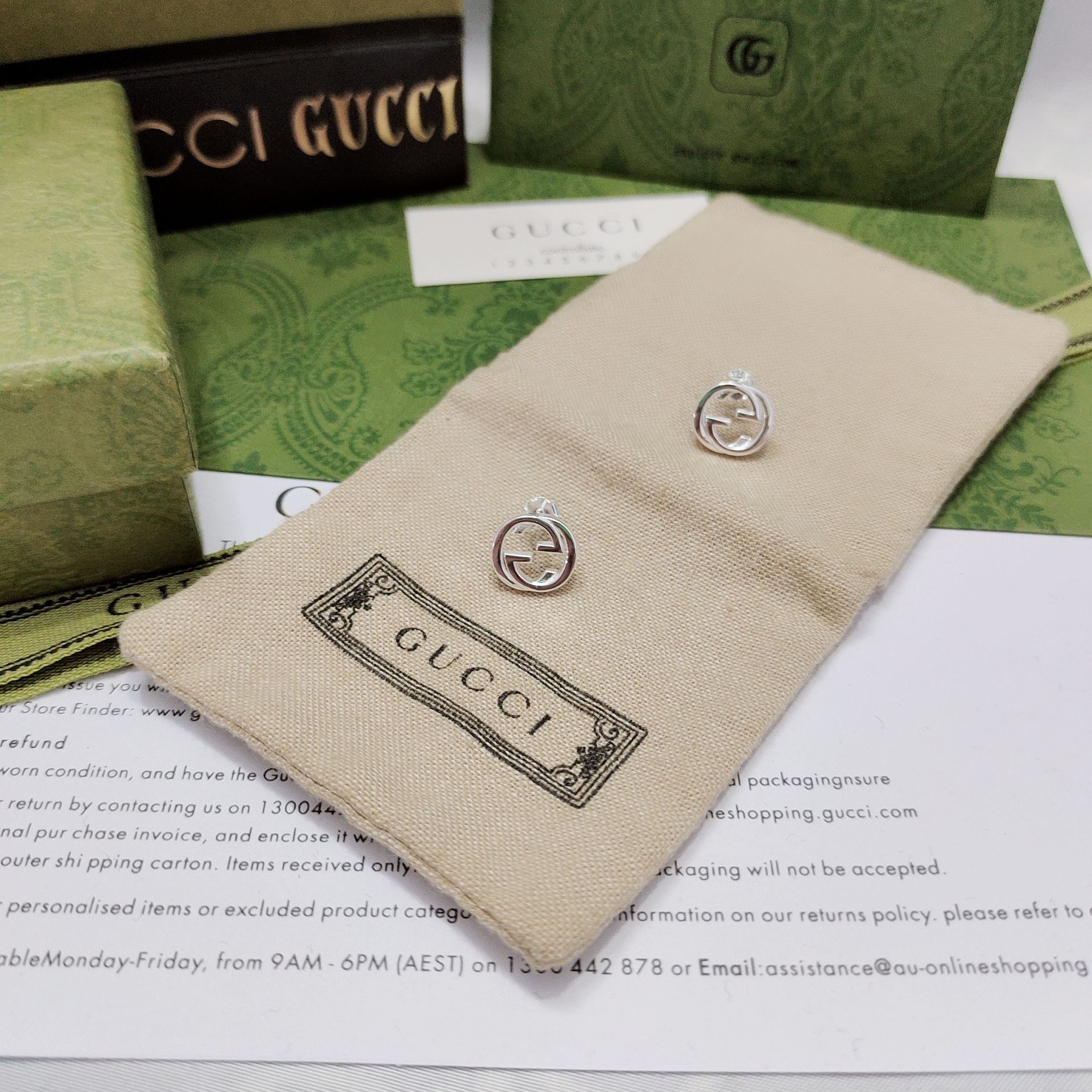 Gucci 銘刻デザインのダブルGスタッズイヤリング