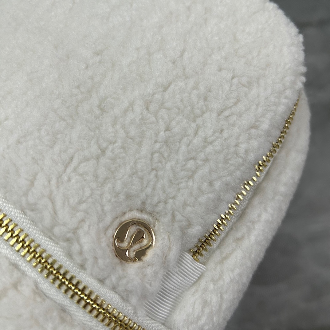 A plush shearling backpack offering an ideal balance of refined - Comprehensive 8