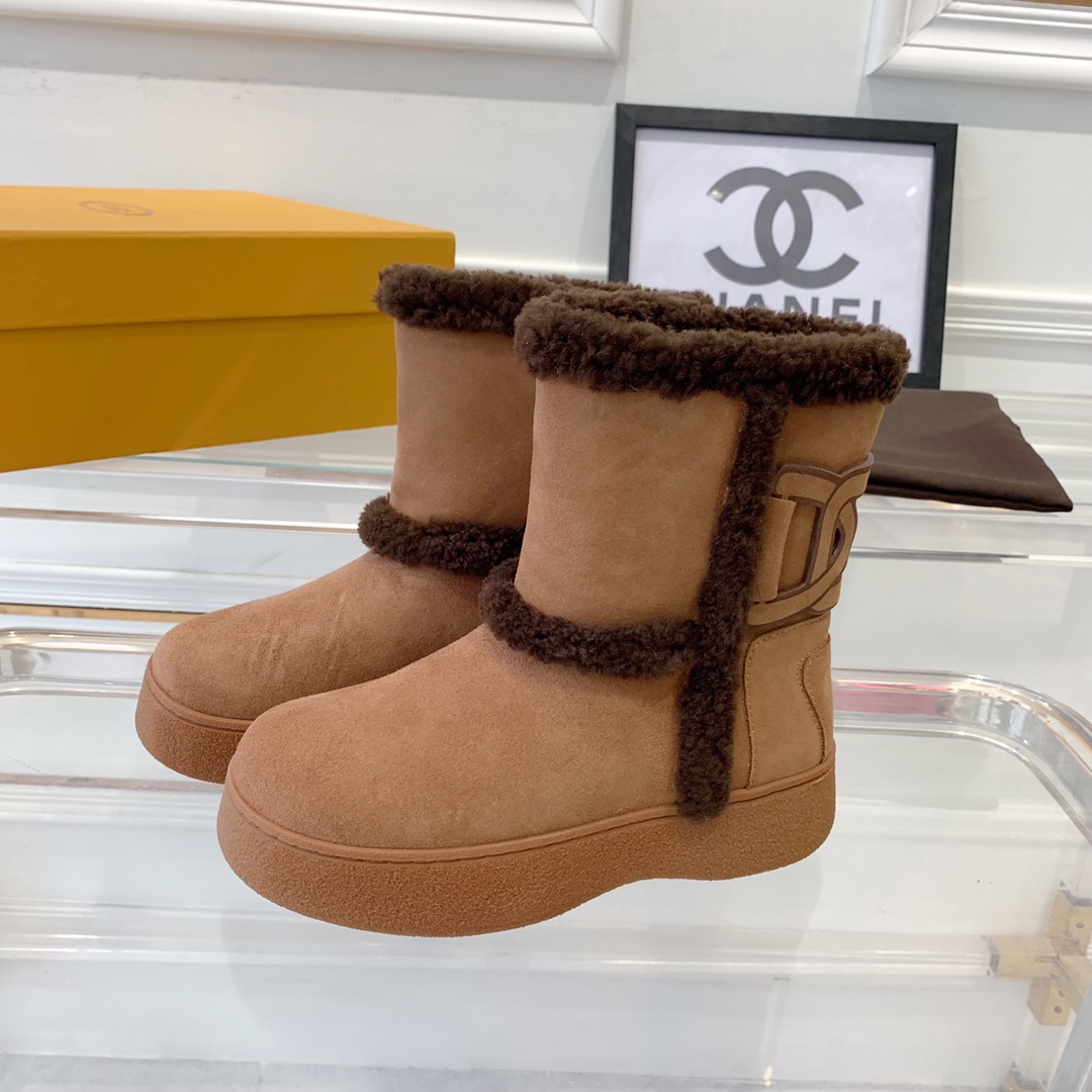 Tod’s New Snow Boots: High-Quality Winter Essential with Water-Resistant Cattle Skins. - 图片 1