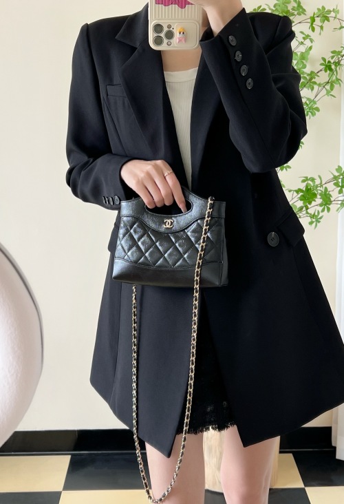 Elegant Quilted Lambskin Top Handle Flap Bag with Chain Strap in Black 1 Elegant Quilted Lambskin Top Handle Flap Bag with Chain Strap in Black