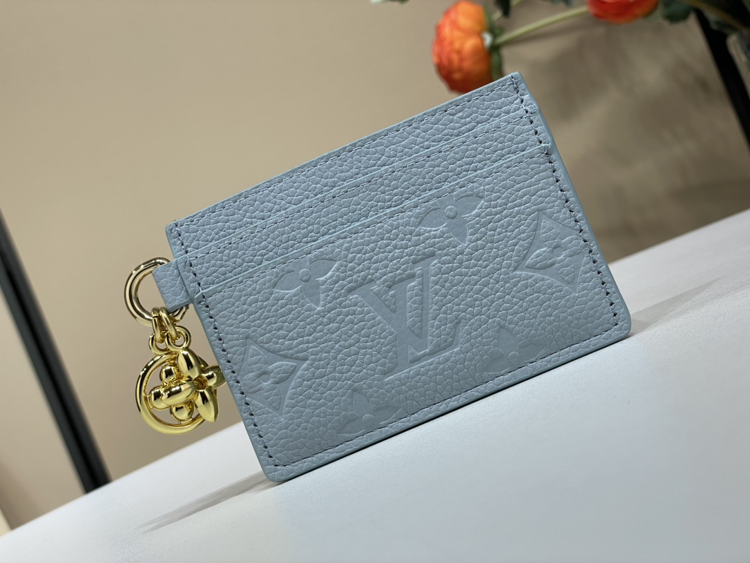 Louis Vuitton Portefeuille Kleine portemonnee Blauw Goud Lichtblauw Empreinte​ Zomercollectie M83585