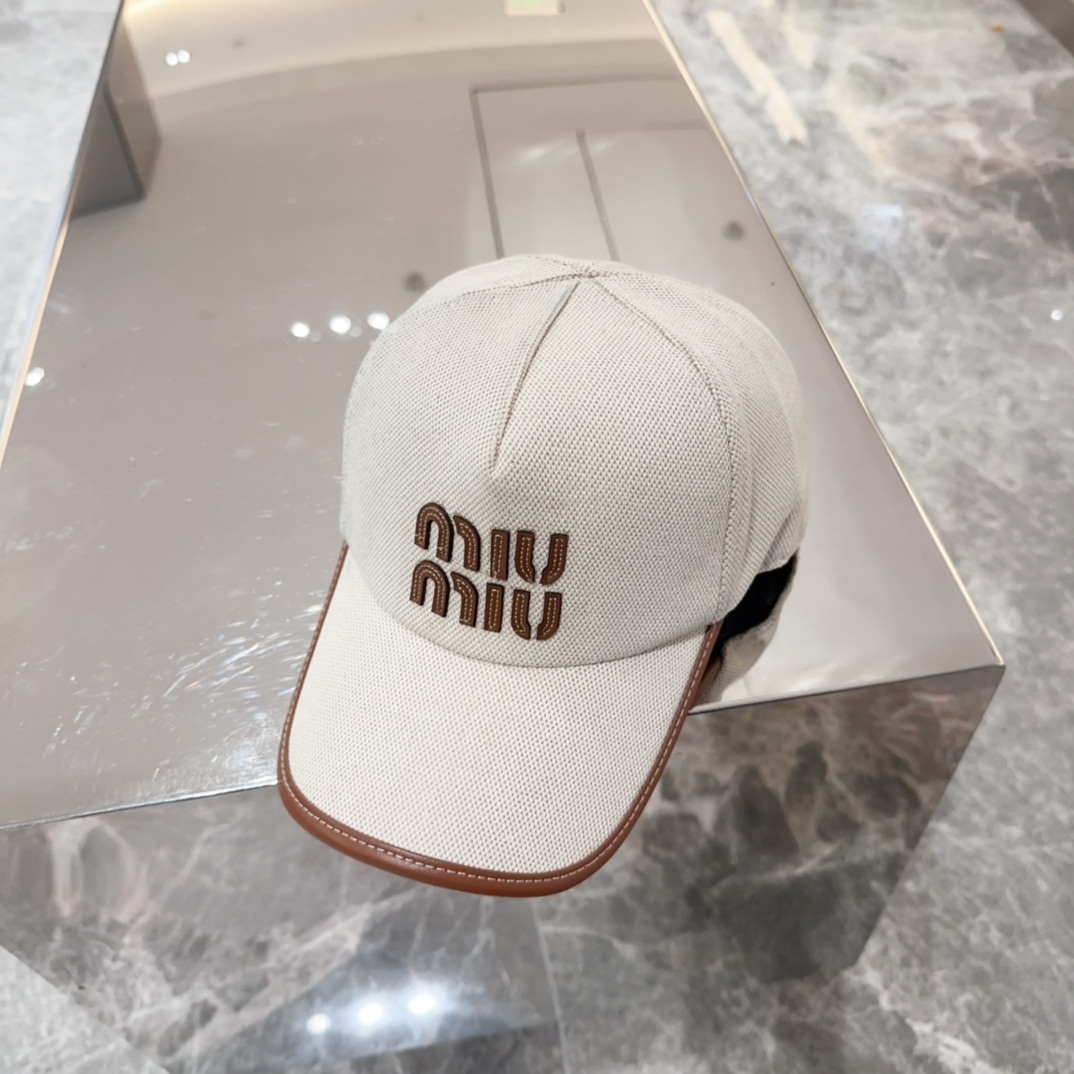 MiuMiu כובעים כובע בייסבול למכירה ברשת
 ניסקס קנבס