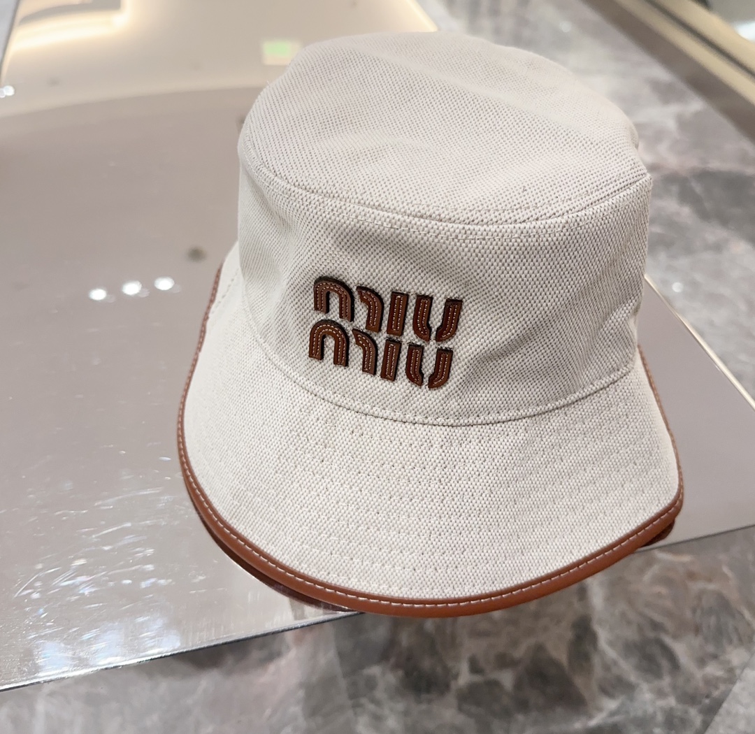 MiuMiu חנות
 כובעים כובע דלי ניסקס קנבס