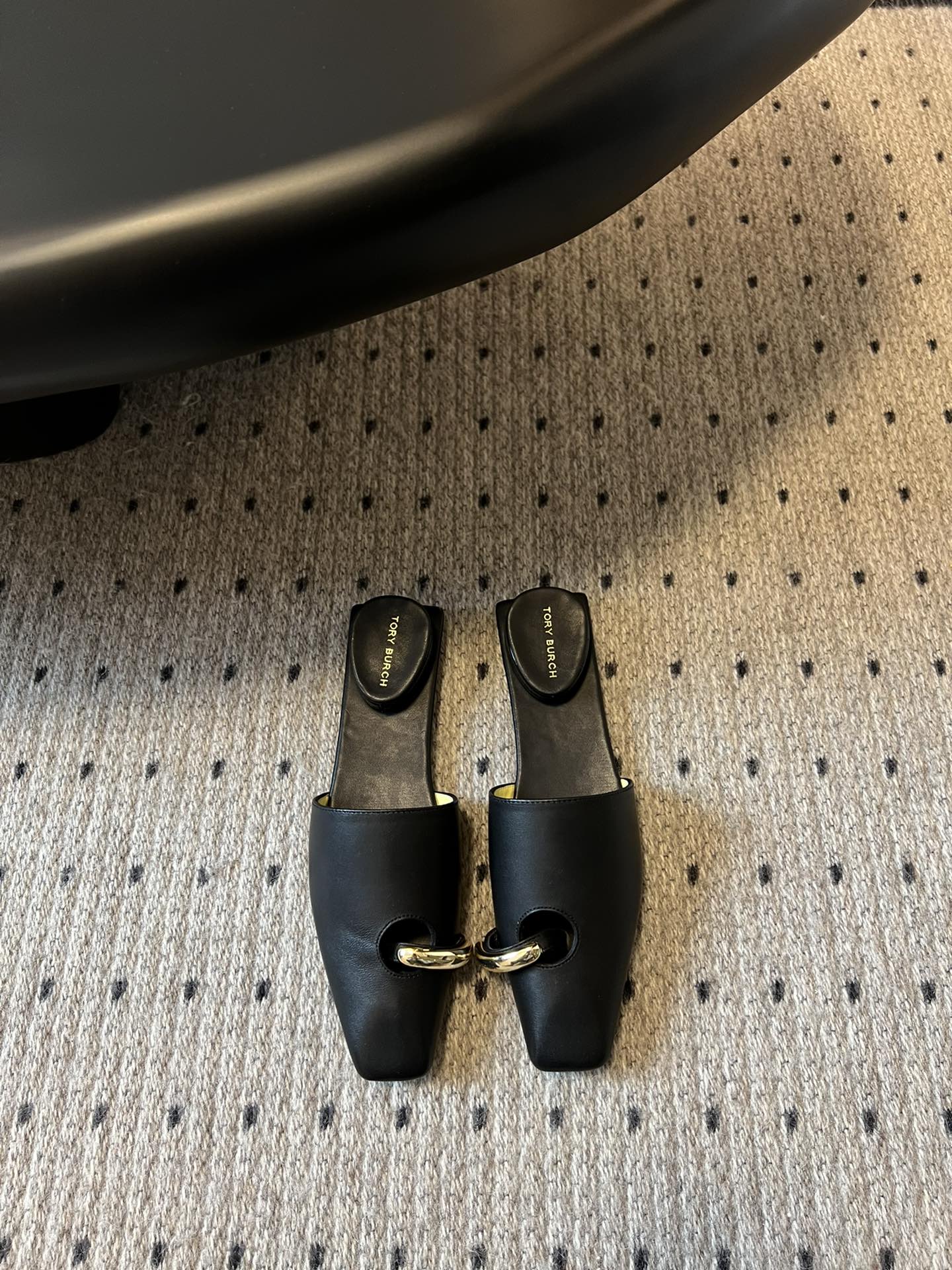 Unique Reverse Design Slipper by Tory Burc: High-Quality Leather, Comfortable, Stylish.