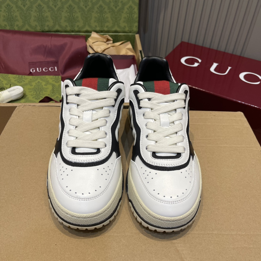 GUCCI Re-Web sneakers en cuir blanc et noir avec languette en bande web