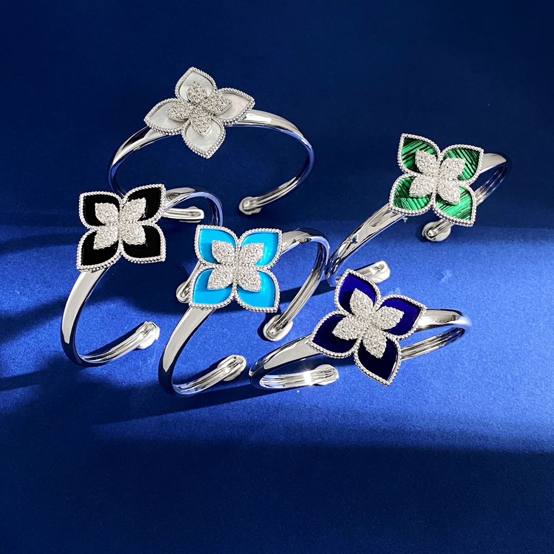 Roberto Coin Four-Carb Bracelets: C-Shaped Silver with Gold Roses.