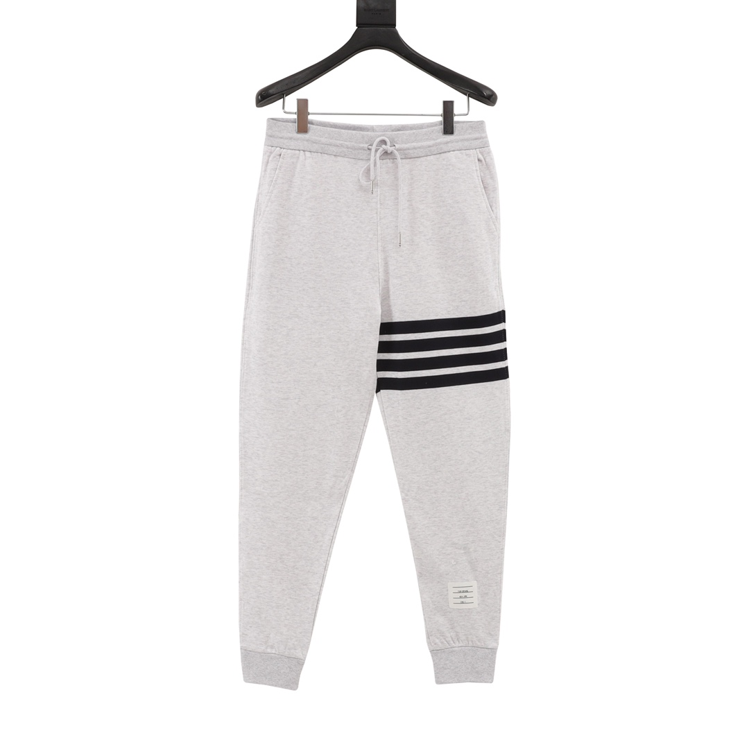 Thom Browne / Tom Browne, pantalones largos de rayas verticales teñidos en nuevo estilo. El tejido está especialmente h…