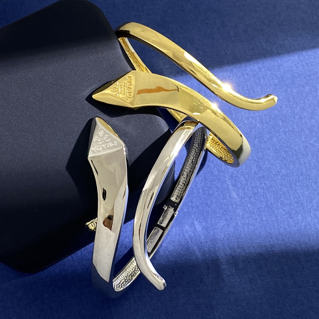 PRADA Snake Head Bracelet: Metallic, Sensory Design in 2 Colors, 18k Gold.
