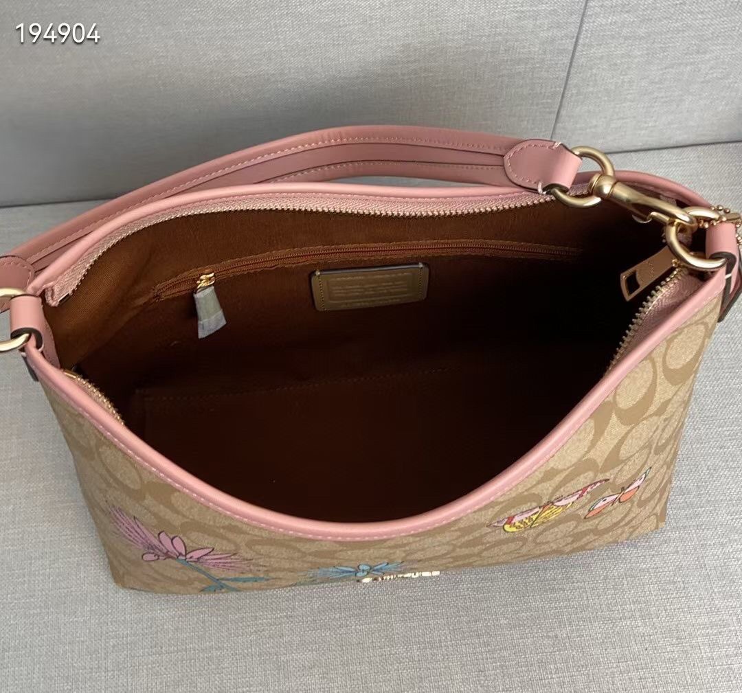 Coach Coach蔻驰最新款Laurel CU393 系列 XObsered限量款花朵蝴蝶印花非常漂亮 顶部带拉链