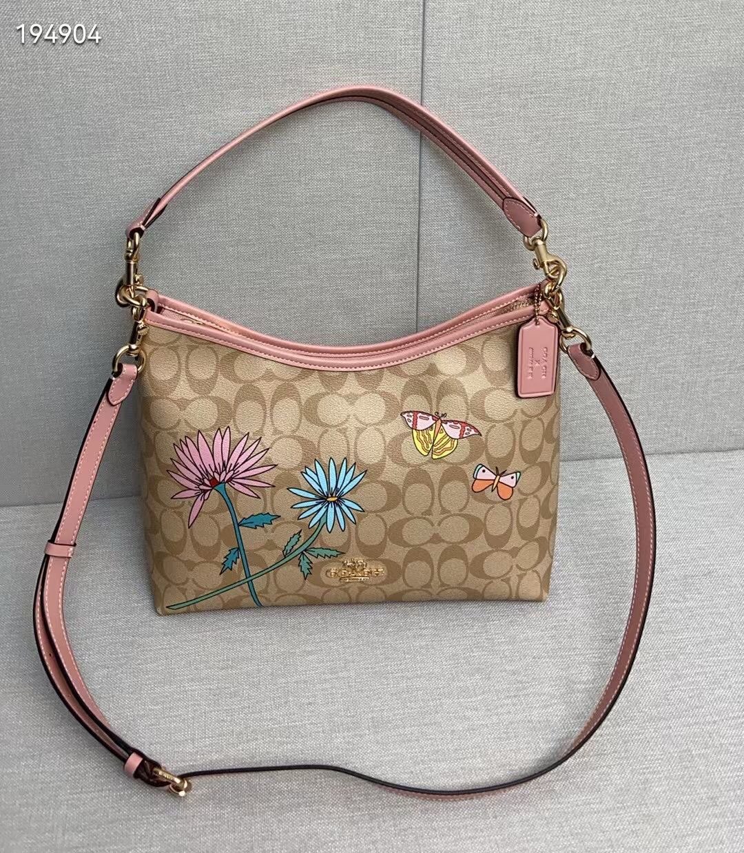 Coach Coach蔻驰最新款Laurel CU393 系列 XObsered限量款花朵蝴蝶印花非常漂亮 顶部带拉链