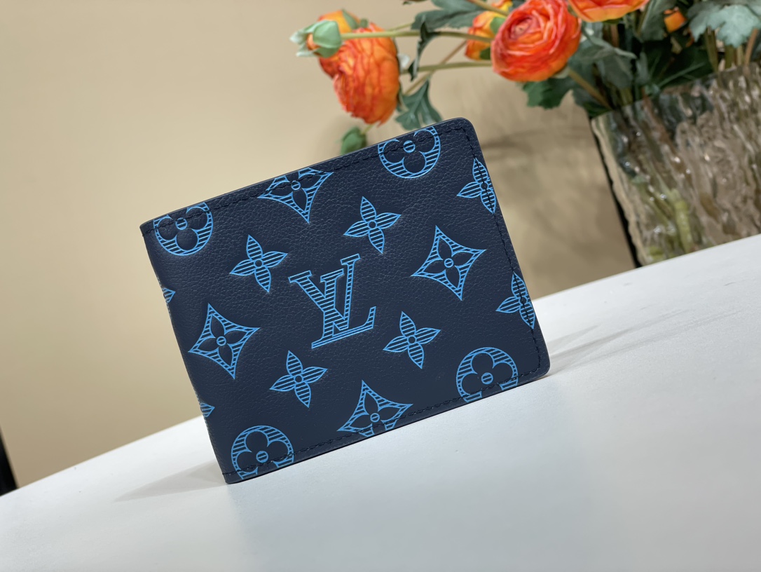 Louis Vuitton Portefeuille Kleine portemonnee Blauw Donkerblauw Koeienhuid M60895