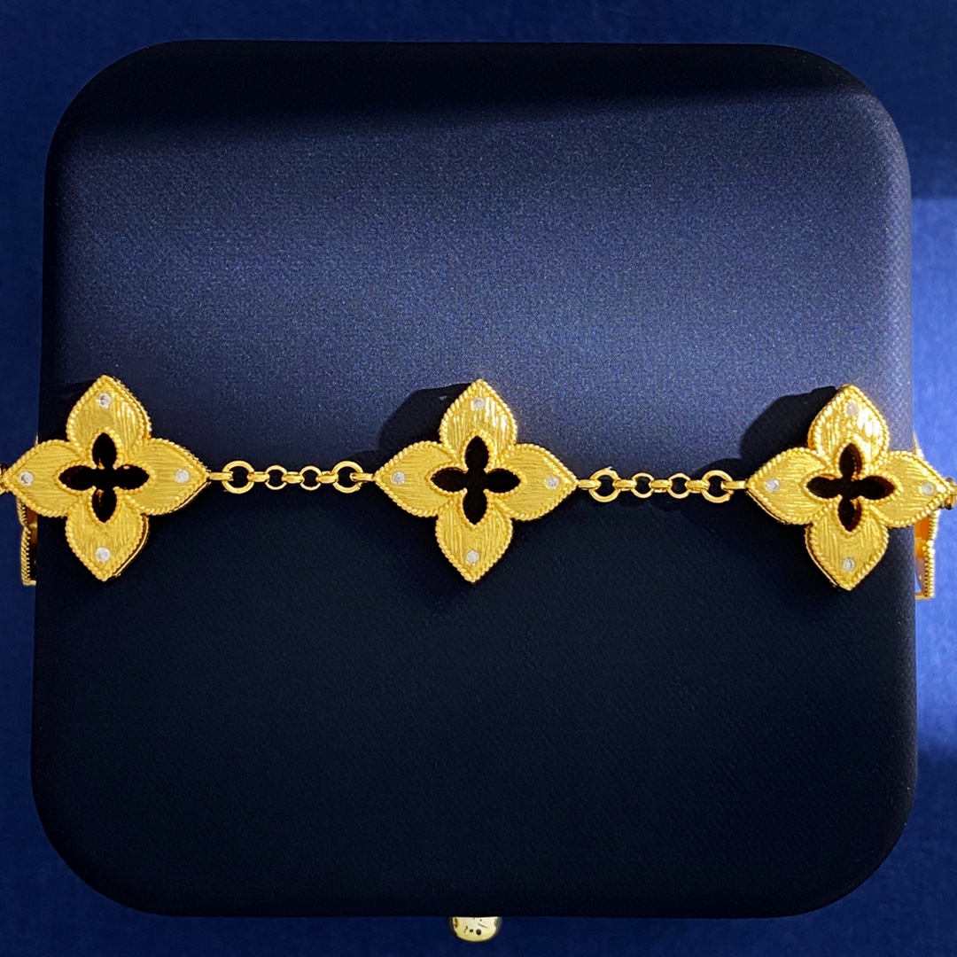 Van Cleef Arpels Venetian Flower bracelet Yellow gold with clear diamond accents and red enamel detail 18cm