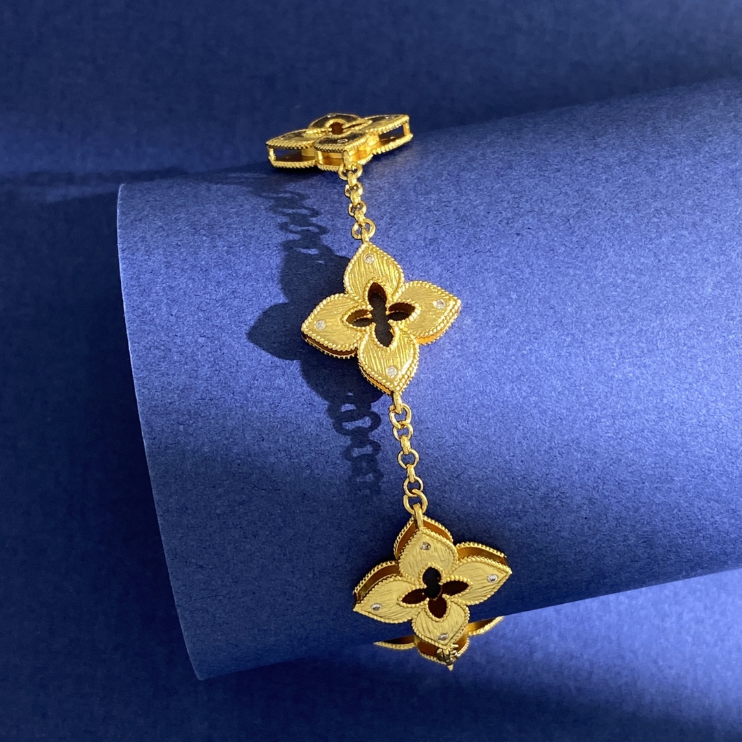 Van Cleef Arpels Venetian Flower bracelet Yellow gold with clear diamond accents and red enamel detail 18cm