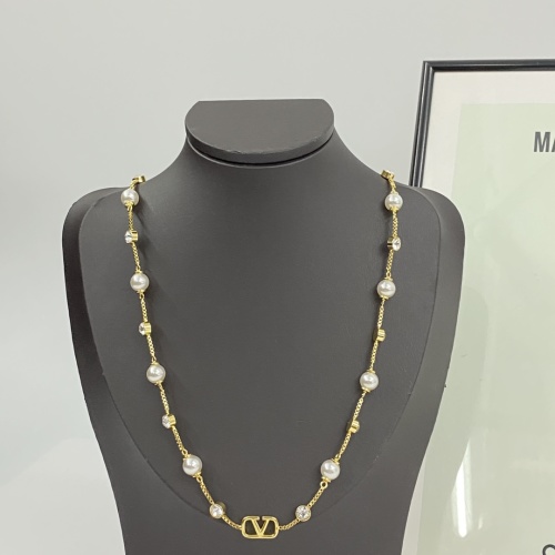 Valentino Gold-Tone Pearl and Crystal Necklace with Classic Logo Pendant 1 Valentino Gold-Tone Pearl and Crystal Necklace with Classic Logo Pendant