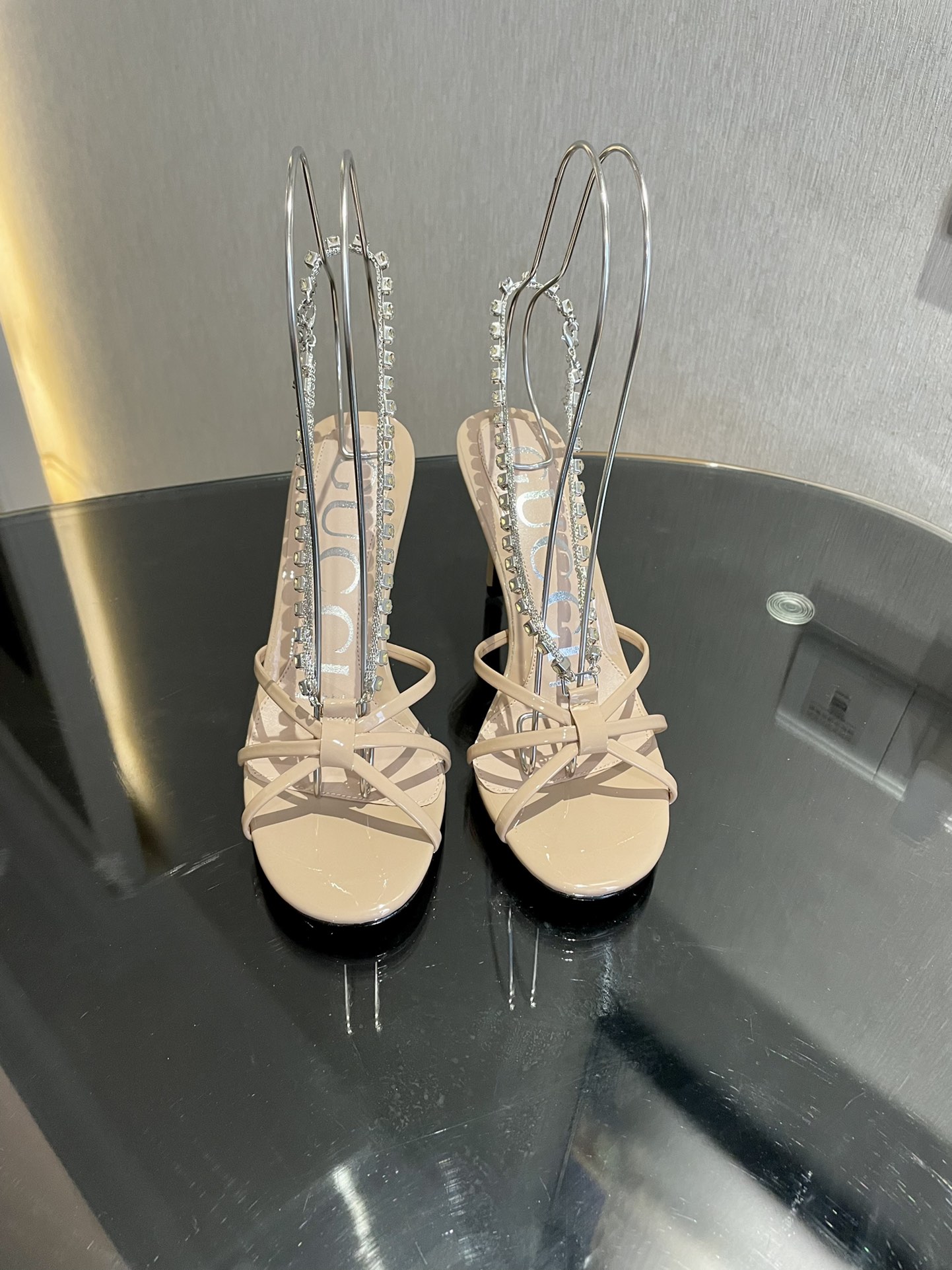 NO:238980,Gucci high heel sandals series!  Every detail has been carefully polished. This sandal is made of patent leather, embellished with crystal chain details, revealing elegant charm. The 