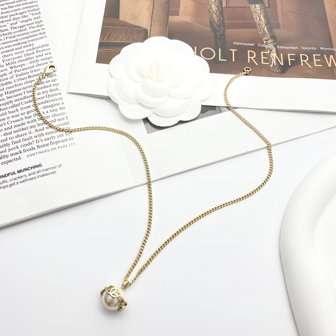 Chanel Mini Letter Pearl Necklace - Iconic CC Design, Elegant & High-Quality 3 i1728718844 5708 1