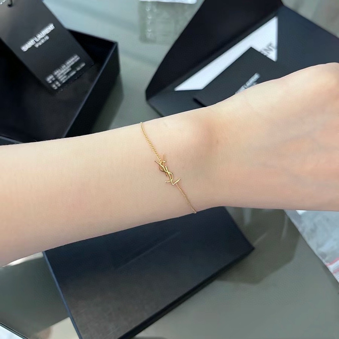 Title: YSL St. Roland Bracelet: Elegant French Luxury Fashion Since 1961 Summary: YSL’s St. Roland bracelet, a luxury fashion icon since 1961, features elegant - 图片 2