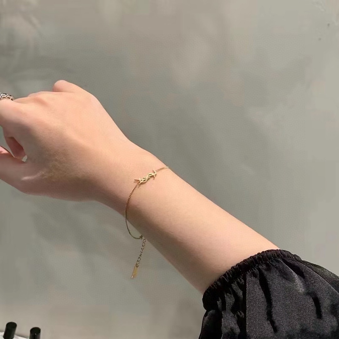 Title: YSL St. Roland Bracelet: Elegant French Luxury Fashion Since 1961 Summary: YSL’s St. Roland bracelet, a luxury fashion icon since 1961, features elegant - 图片 3