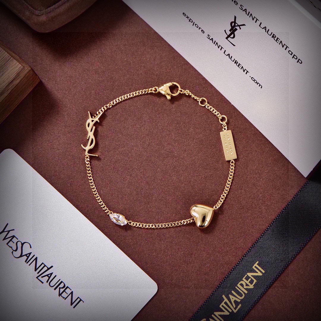 “Yves Saint Laurent: Luxury Fashion Brand with Elegant French Style and Abstract Design” - 图片 1