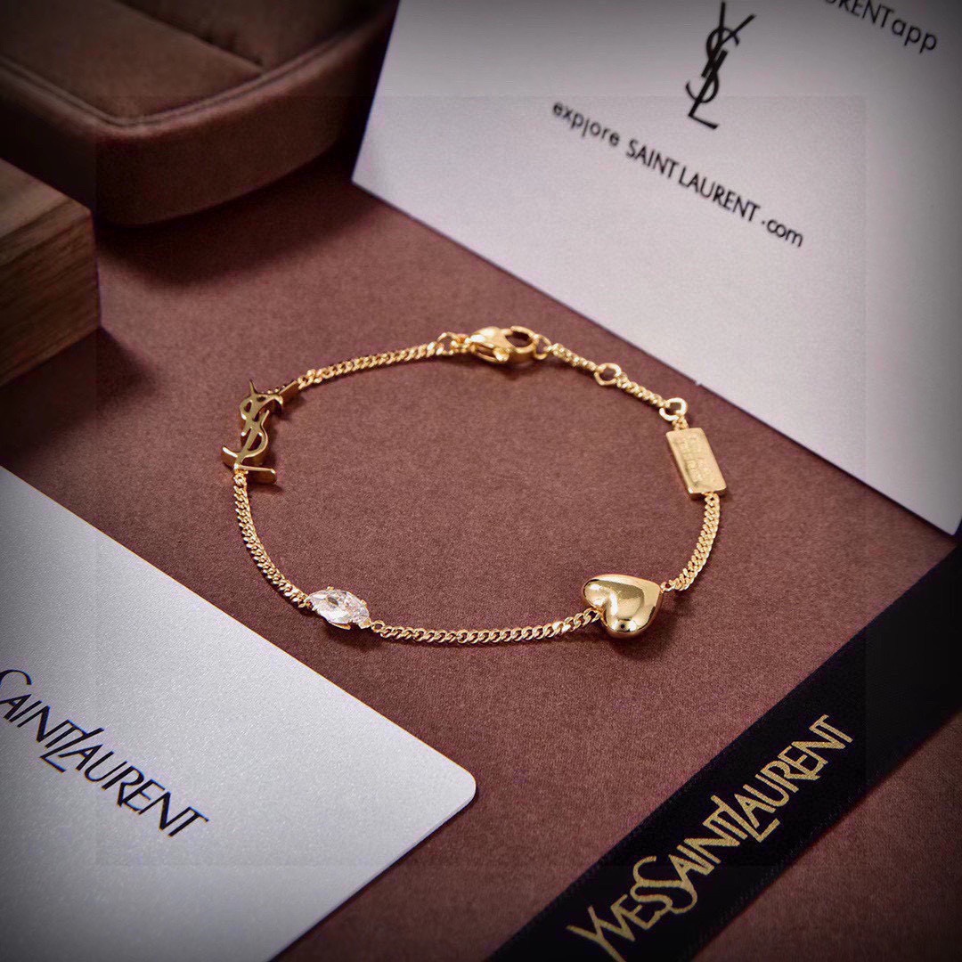 “Yves Saint Laurent: Luxury Fashion Brand with Elegant French Style and Abstract Design” - 图片 4