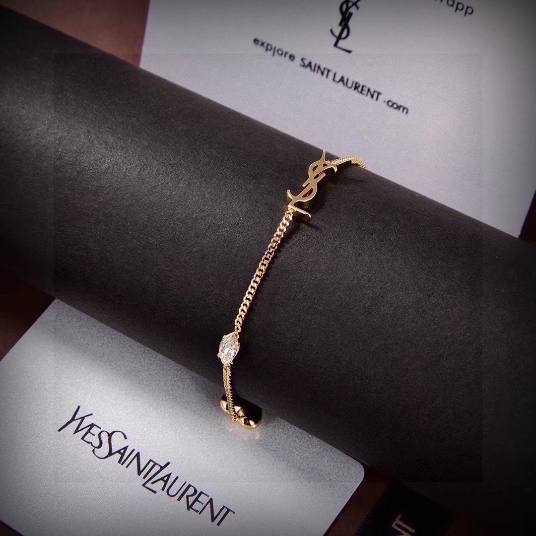 “Yves Saint Laurent: Luxury Fashion Brand with Elegant French Style and Abstract Design” - 图片 6
