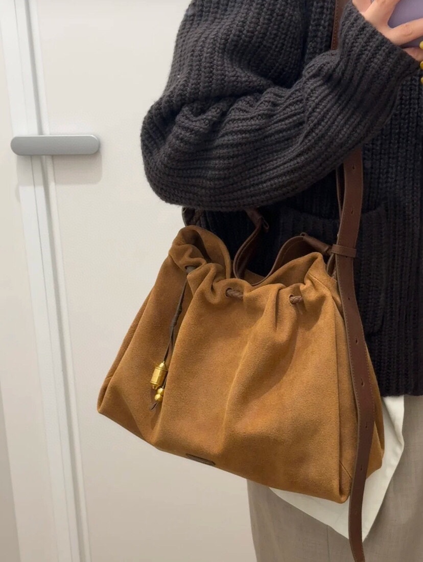 Crafted from deerskin, this hobo bag features a relaxed silhouette with - Comprehensive 5