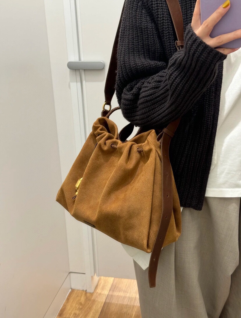 Crafted from deerskin, this hobo bag features a relaxed silhouette with - Comprehensive 6