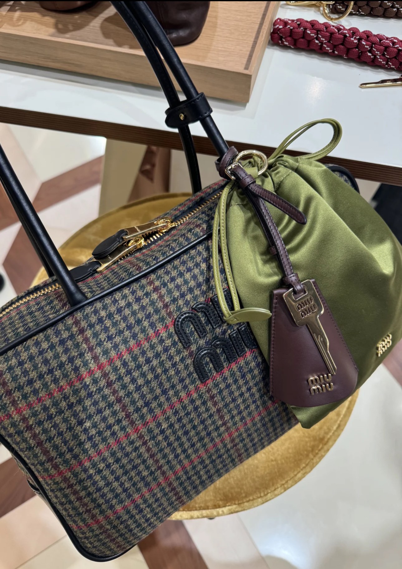 Miu Miu Olive green tartan, available now