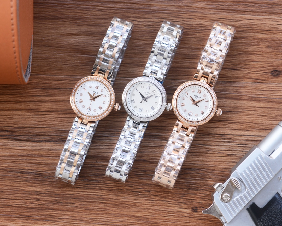 “Ms. TISSOT’s Classic White Gold Drill Wristwatch with Sapphire Mirror”