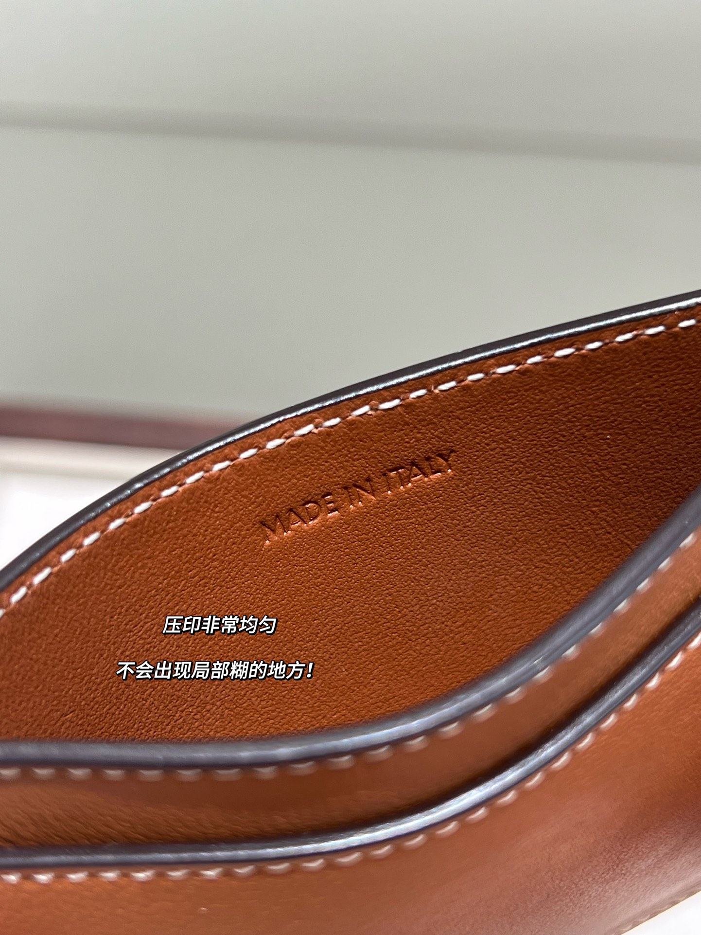 The card holder is designed with three dedicated slots, accommodating up - Tie 3