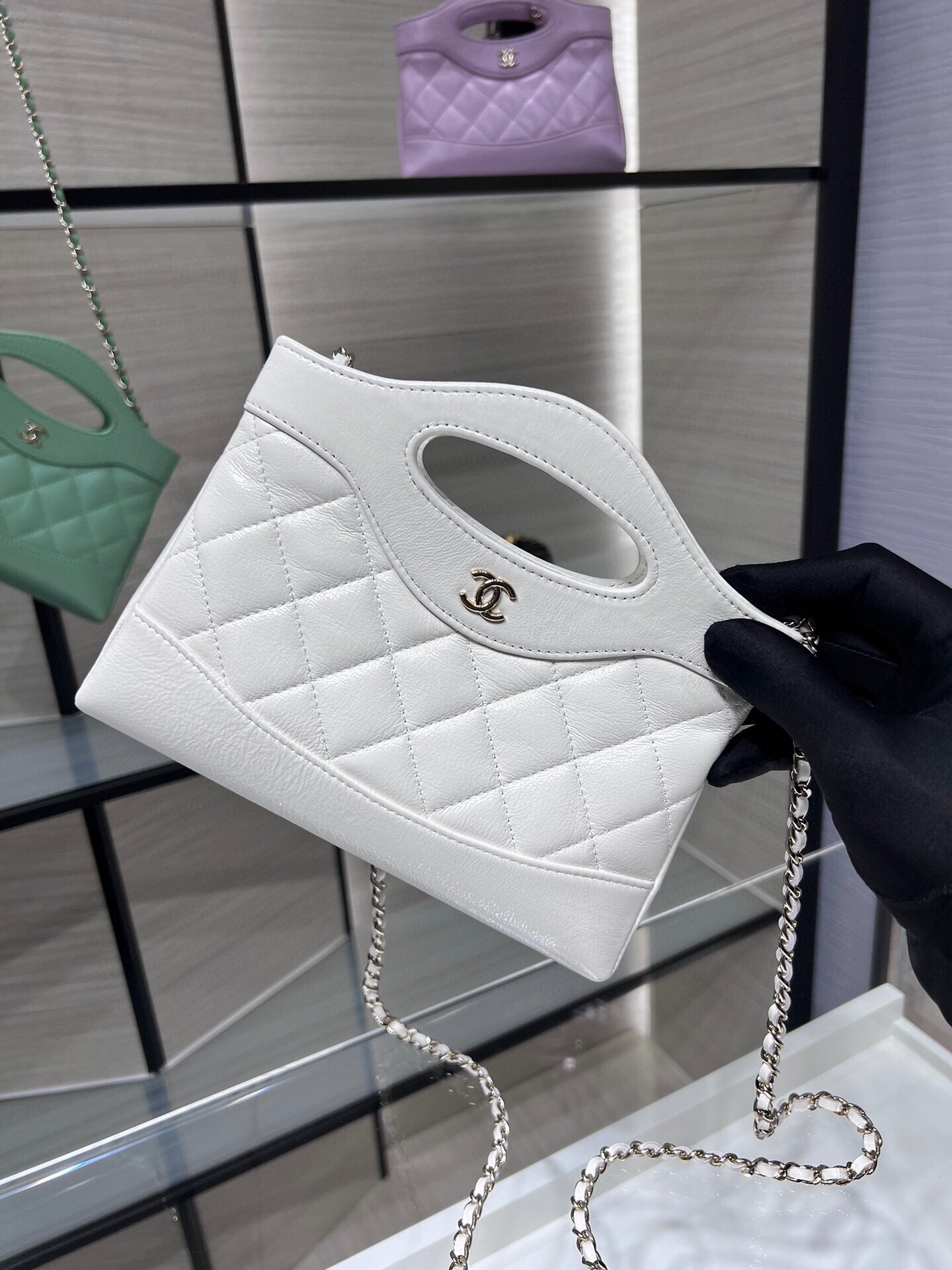 CHANEL Pochette with Chain
