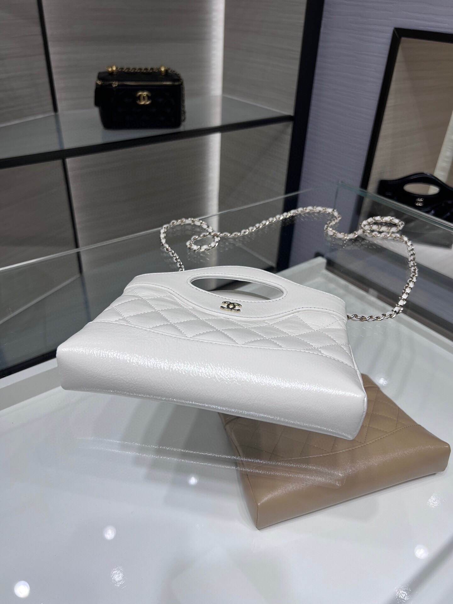 CHANEL Pochette with Chain