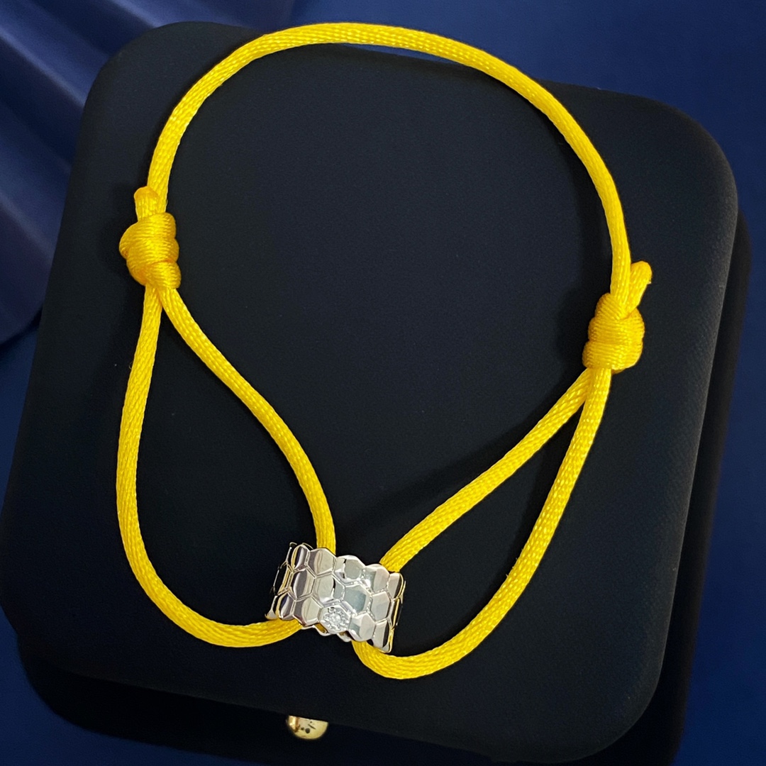 Luxury Jewelry Collection Featuring Silver, Gold, Brass, and Hand-Woven Red Rope - 图片 3