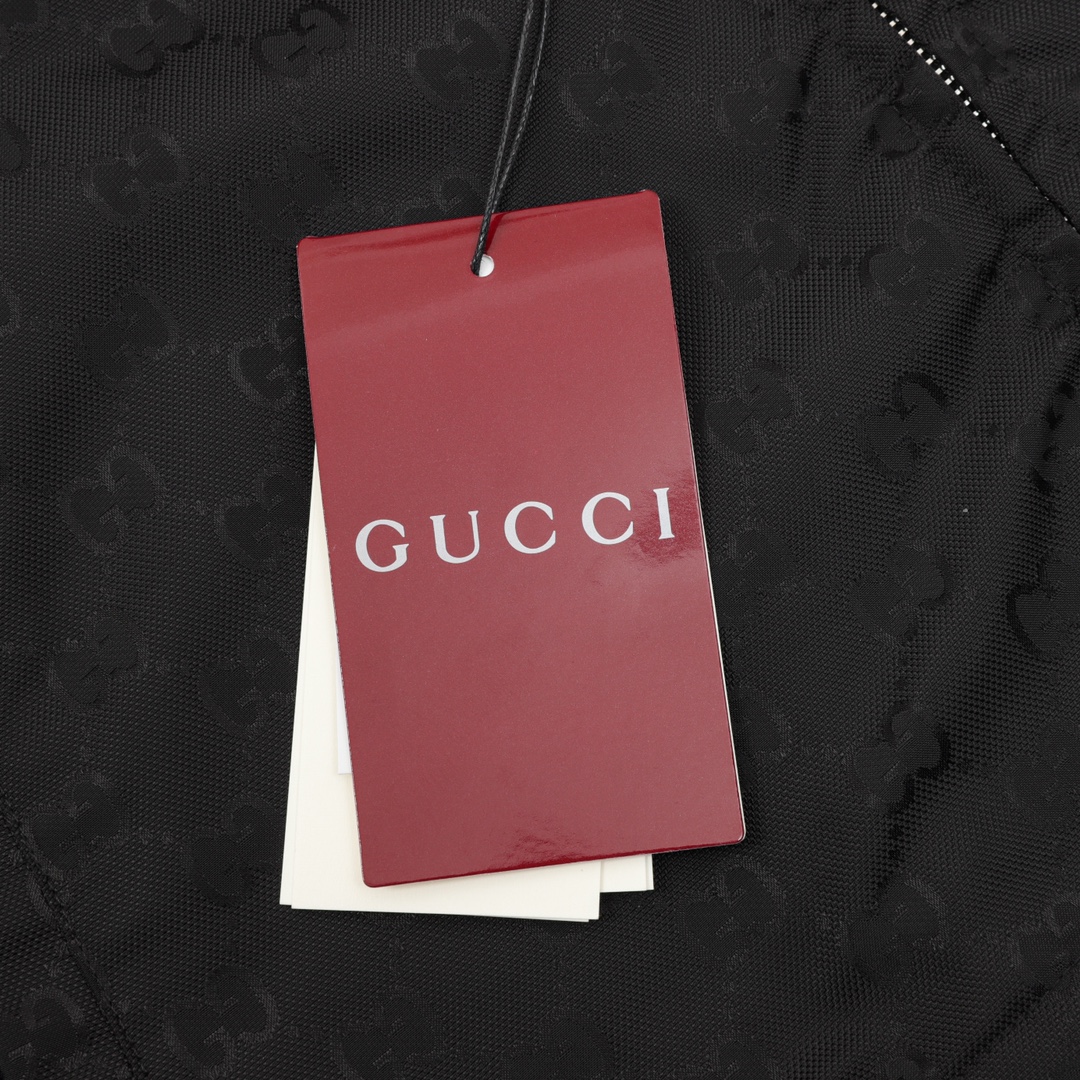 GUCCI/古驰 拼接印花LOGO连帽风衣外套 采用黑白面料拼接