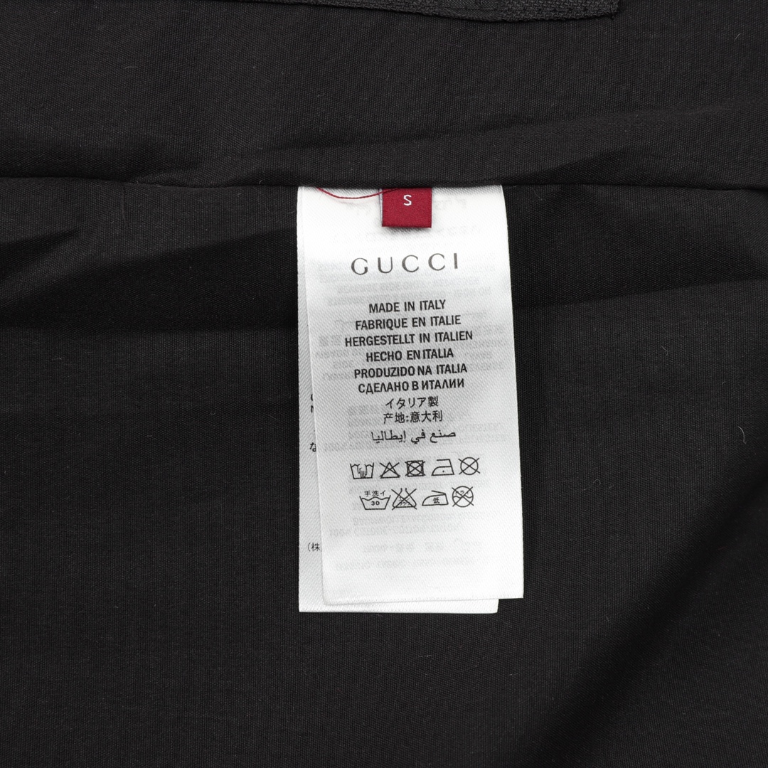 GUCCI/古驰 拼接印花LOGO连帽风衣外套 采用黑白面料拼接