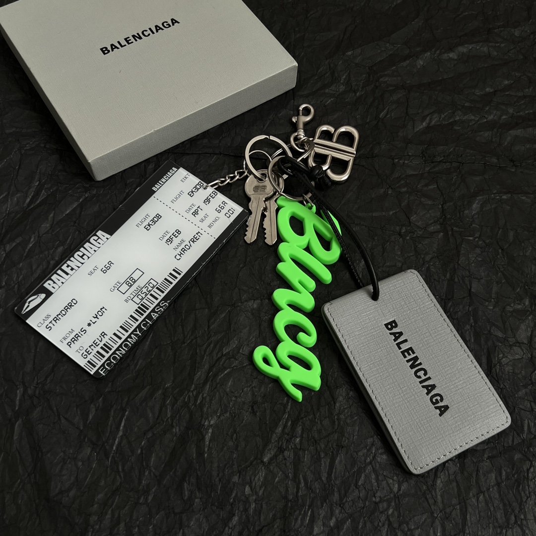 Parisian Balenciaga Passport Card: Elegant, Simple, Gold-Filled Key Buttons for Stylish Wardrobe