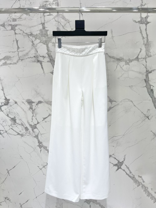 Yves Saint Laurent High-Waisted White Trousers with Pearl Embellishments 1 Yves Saint Laurent High-Waisted White Trousers with Pearl Embellishments