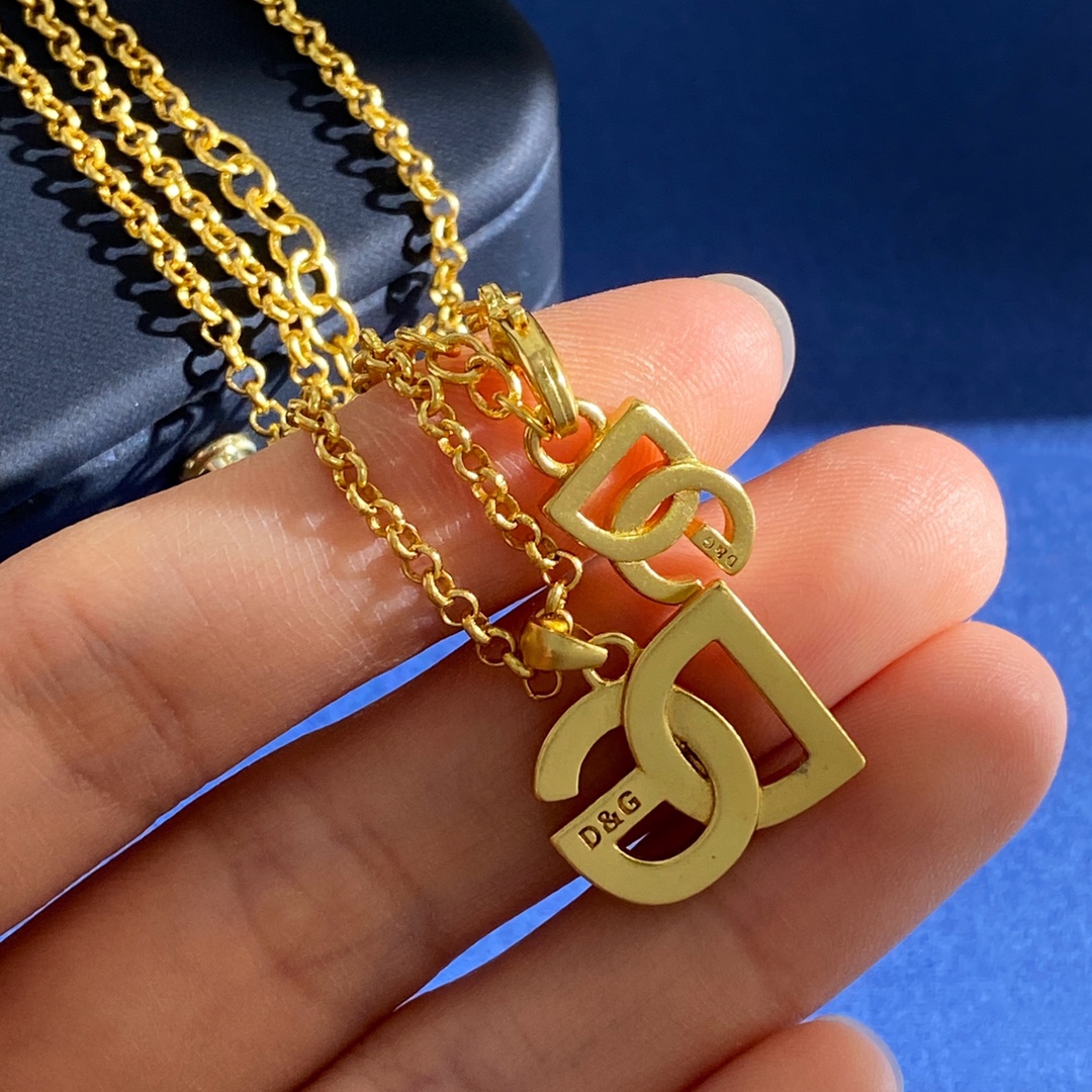D&G Dugarbana High-End Fashion: Glittering Retrospective in Copper and Silver Brass - 图片 5