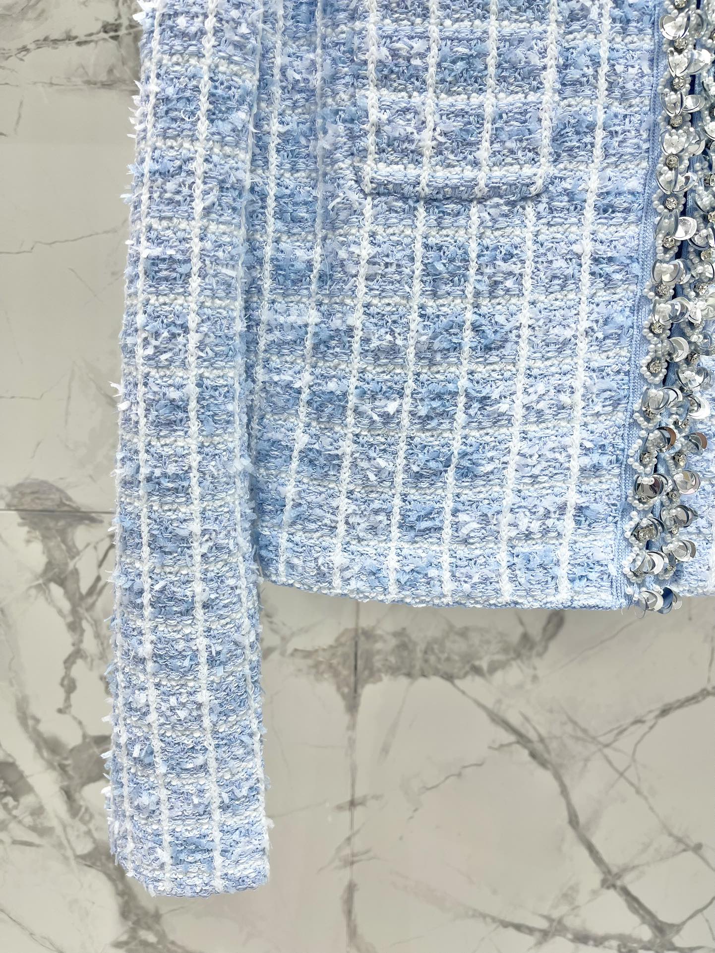 𝘀𝗲𝗹𝗳-𝗽𝗼𝗿𝘁𝗿𝗮𝗶* 2025春夏新款

蓝混色钻饰💎针织开衫


码数SML
